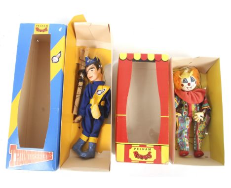 A collection of two Pelham puppets. Comprising one Thuunderbirds puppet and one other, both boxed. 