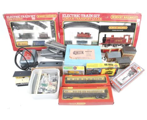 Two Hornby OO Gauge train sets. Comprising one GWR tank engine and one LMS Class 3 tank engine both with wagons and track etc