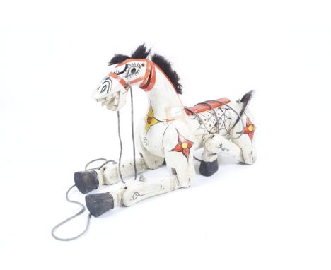 A wooden 'Muffin the Mule' Marionette puppet. Painted white with red bridle. 