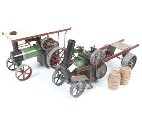 Two Mamod live steam engines. Comprising one traction engine and one flatbed truck, one boxed. 