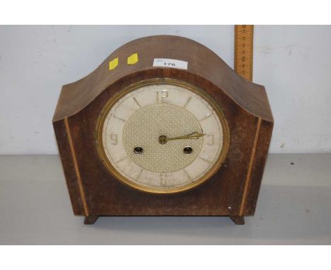 A dome topped mantel clock