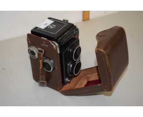 A vintage Yashica-A camera in leather case