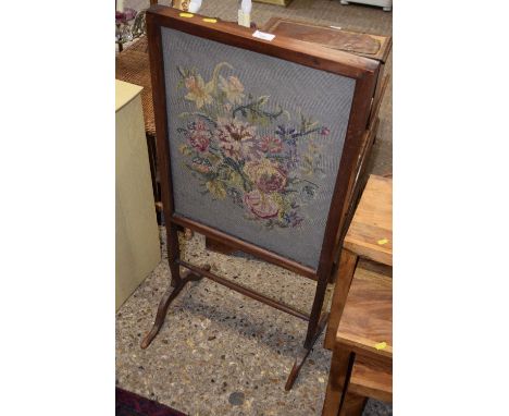 Needlework fire screen
