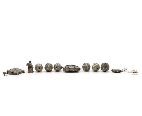 A collection of Indian white metal items to include a filigree purse, 10cm wide, a vespa case or holder, 6cm long, and a grou