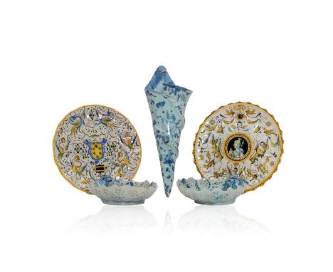 A group of Cantagalli maiolica pottery late 19th century, comprising a pair of dishes, each moulded with a mask and painted w