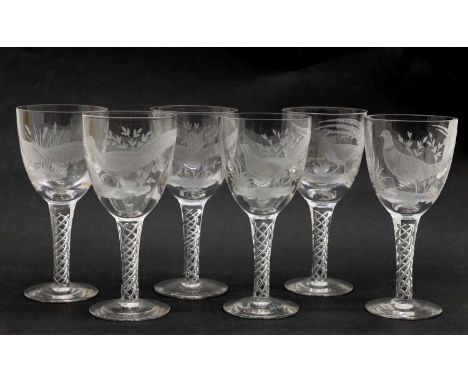 A set of six Peter Dreiser wine glasses, the conical bowls decorated with pheasants amongst foliage, on air twist stems and c