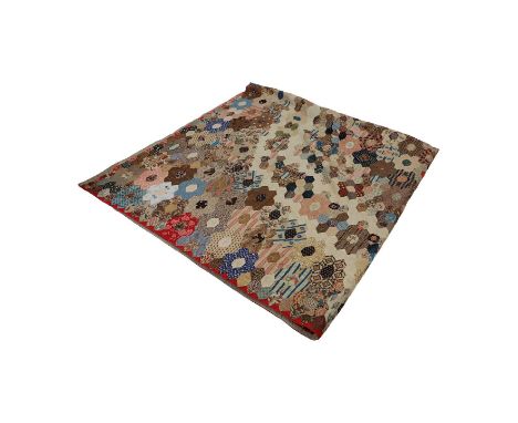A patchwork quilt 19th century, worked in various fabrics, including some chintz examples,240 x 236cmCondition ReportLight di