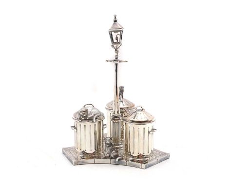 A novelty silver condiment set, by Garrards, London 1995, modelled as three dustbins, with three cats, on a pavement, centred
