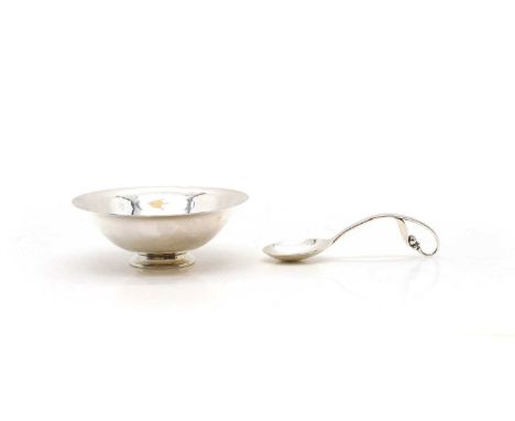 A Georg Jensen sterling silver bowl and spoon, import marks for 1962, the bowl, designed by Harald Nielsen and numbered '575'