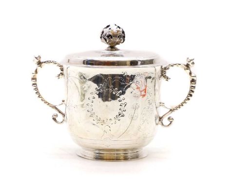 An Edwardian silver porringer and cover by Joseph Heming &amp; Co, London 1908, in the 17th century style, with chased decora