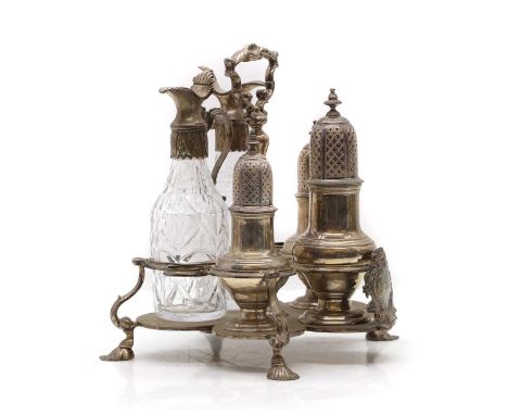 A George III silver cruet stand, the stand by Samuel Wood, London 1744, with three fitted sifters and two cut glass cruet bot
