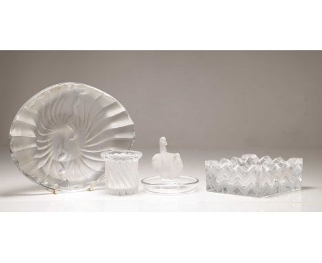 A group of Lalique glass items comprising a 'Deux Cygnes' cendrier, 9cm high, a 'Nancy' dish, 21.5cm wide, a 'Smyrne' cigaret