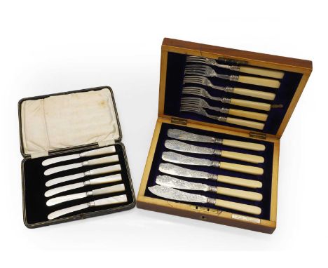 A cased set of silver fish eaters, by Levesley Brothers, Sheffield 1902, with silver blades and tines, complete with ivorine 