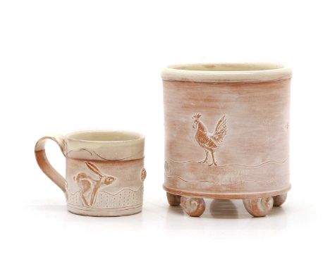 A Philip Wood pottery brush pot partially glazed, monogram to body,13cm high together with a small mug,6.5cm high (2)Conditio