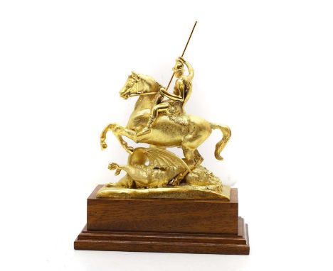 'George and the Dragon' a silver-gilt sculpture, London 1999, on a wood plinth, 19cm wide 11.5cm deep25cm highCondition Repor