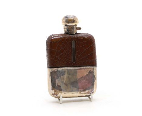 An Edwardian silver hip flask, by G &amp; J W Hawksley, Sheffield 1916, mounted with crocodile skin, monogrammed to the top a