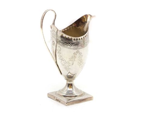 A George III silver helmet shaped cream jug, makers mark PB..., London 1791,14cm high, 2.9oztCondition ReportRubbed, bent edg