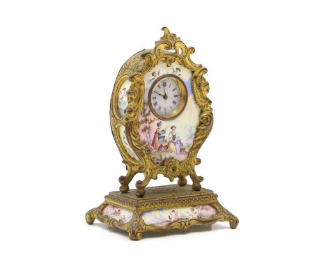 An enamelled timepiece late 19th century, Vienna, enamelled with two figures enclosed within a gilt metal Rococo case,10.7cm 