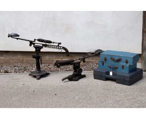 A large collection of clay pigeon throwers to include a C. Hellis &amp; Sons, London, and a R. Blouton example 102cm overall,