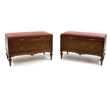 A pair of Louis XVI-style beech and leather combination Ottomans and luggage racks, 20th century, each hinged leather seat en
