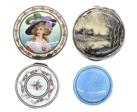 A group of four silver and enamel boxes and covers to include an example by Cohen &amp; Charles, decorated with a landscape s