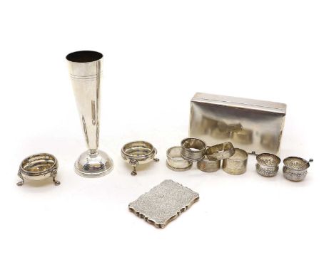 A assorted group of silver items to include a silver cigarette box with divsioned interior, by Mappin &amp; Webb, London 1887