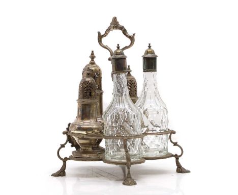 A George III silver cruet stand, the stand by Jabez Daniell &amp; Jams Mince, London 1767, with three fitted sifters and two 