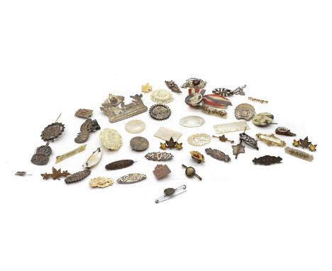 A collection of silver name brooches of various sizes, to include a silver circular brooch with 'Ada' centre Birmingham 1882,