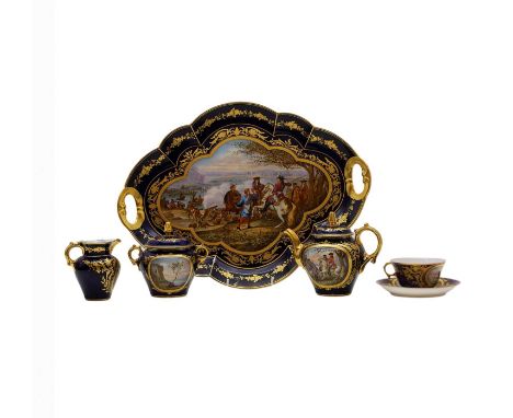 A Sèvres style porcelain tête-à-tête set, late 19th century, hand-painted with historic battle scenes, inscribed Passage du R
