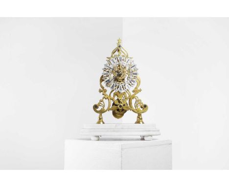 A Victorian brass skeleton clock, second half of the 19th century, the silvered chapter ring with Roman numerals, with a sing