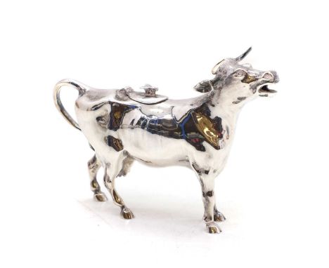 A silver cow creamer, by Garrard &amp; Co Ltd, London 14.5cm wide, 9.4oztCondition ReportWith minor surface scratches. Residu