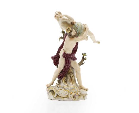 A Meissen porcelain figure of 'The Rape of Persephone'  c.1860-70, the crowned Hades (Pluto) with flowing robe carrying Persp