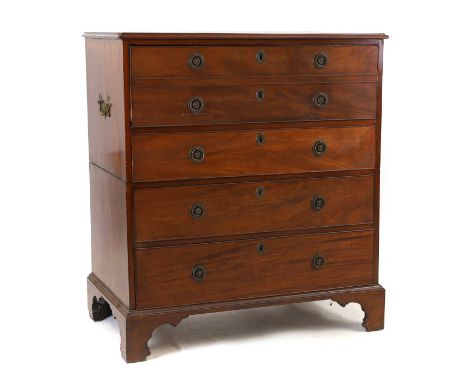 A Regency mahogany secretaire chest of drawers, c.1810, in two halves, with fitted writing drawer, the small cupboards inlaid
