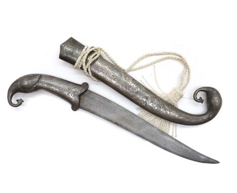 A silver-inlaid dagger, late 19th/early 20th century, the curved 11.5-inch steel blade with watered pattern and bird handle, 