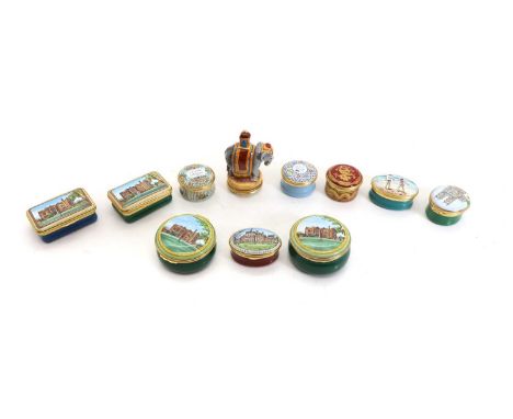 A collection of Halcyon Days enamel boxes, four with 'Chequers' to the lids, one a musical box, largest 6.5cm diameter, an In