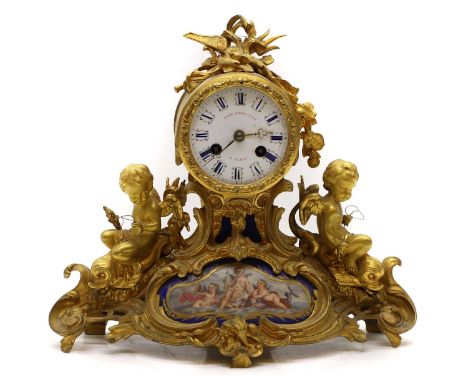 An ormolu and porcelain mantel clock, 19th century, by Alphonse Giroux &amp; Cie., Paris, with a two train movement,25cm high