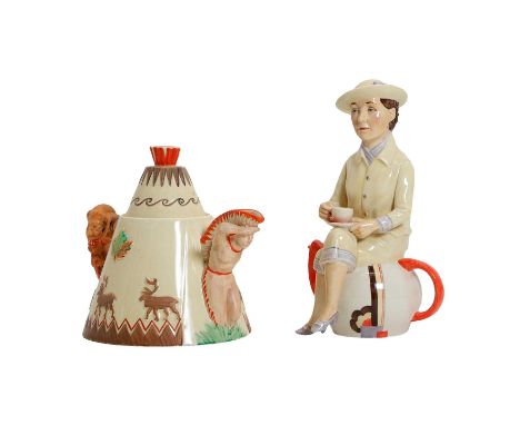 A Clarice Cliff ‘Greetings from Canada’ teapot, c.1930, formed as a teepee, and a Kevin Francis character jug, modelled as Su