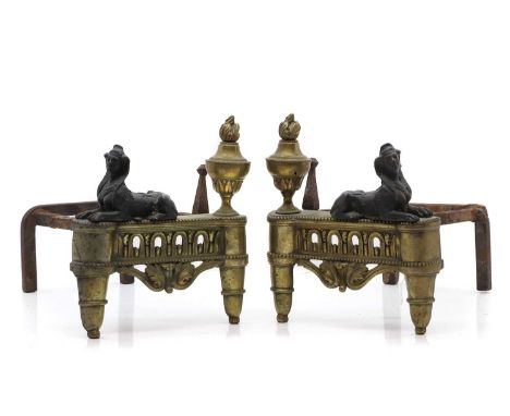 A pair of Empire brass and bronze andirons, 19th century, French, modelled with sphinxes,35cm longCondition ReportOxidisation
