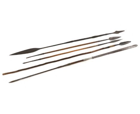 Two North African throwing spears the lonzenge steel blades on hardwood handles with spike ends147cm long,together with two d
