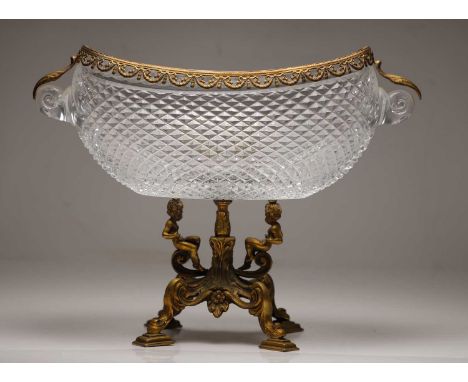 A cut glass and gilt metal mounted pedestal bowl, 19th century, of boat shape with diamond cutting,34cm wide25cm highConditio