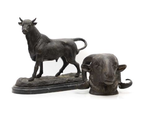 After A. L. Barye, a bronze bull, raised on a granite plinth,35cm wide28cm highand a bronze ram,19th century, wall mounted,20