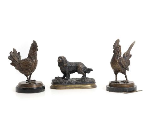 A bronze model of a standing spaniel 20th century, after Jules Meneon an oval stepped base19cm wide13.5cm hightogether with a