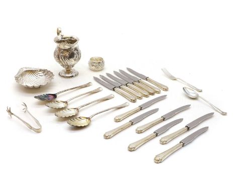 A collection of silver items comprising a cream jug, by Goldsmiths &amp; Silversmiths Co Ltd, London 1917, 11.7cm high, a set