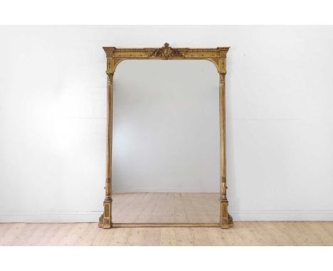 A Louis XVI-style carved giltwood and gesso overmantel mirror, late 19th century, with acanthus-carved ornament and a foliate