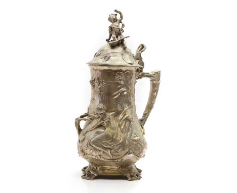A large WMF style pewter ewer, c.1900, decorated with nude figures,40.5cm highCondition ReportSome wear to the plating. Minor
