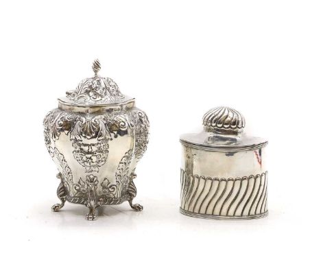 An Victorian silver tea caddy, by George Nathan &amp; Ridley Hayes, Chester, 1897, embossed with floral scrolling, with a hin
