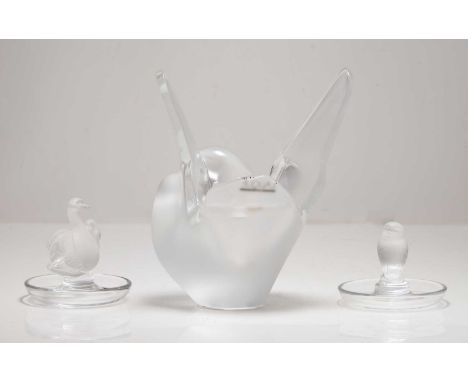 Two Lalique glass ring stands, 9.5cm and 7.5cm high, and a Lalique 'Doves glass vase,  two entwined doves, with a removable g