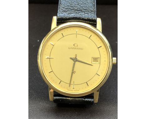 9ct Gold cased Garrard quartz wristwatch with date app at 3 o clock, inscribed in recognition 1972-1987 with original box  