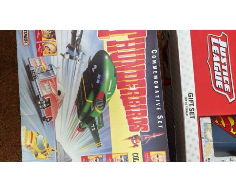 Includes iconic vehicles from the classic series and a Justice League Gift Set featuring Superman-themed collectibles. Both i