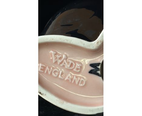 Set of five vintage Wade England NatWest piggy bank figurines, hand-painted ceramic with charming character designs. Highly c